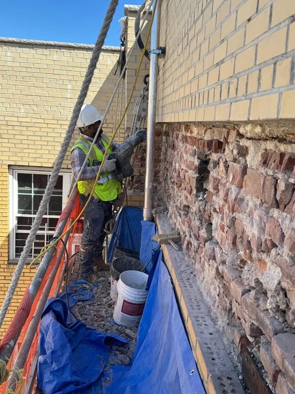 Exterior painting of a multi-story Bronx apartment building