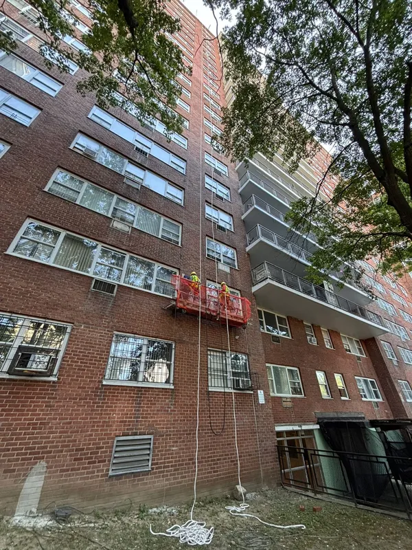 Doon Construction team performing exterior restoration on a Bronx building